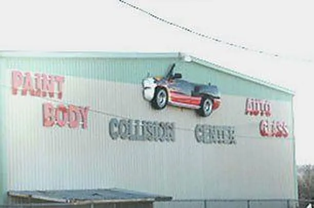 Mineral Wells Collision Center sign outside the shop on Market Street